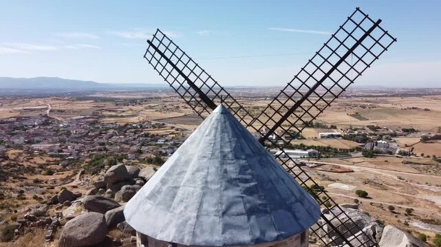 Aerial Drone View Orbiting the Blades of the Windmill in Las Ventas with Pe&ntilde;a Aguilera, Toledo - 684
