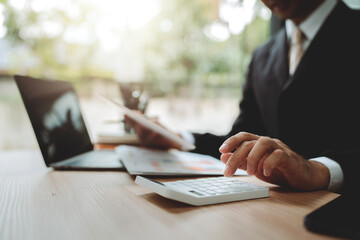 Financial professionals are calculating personal taxes for their clients.