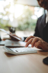 Financial professionals are calculating personal taxes for their clients.