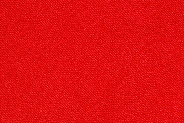 Red cotton twill fabric pattern close up as background