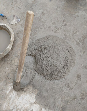 Mixed mortar cement in container ready to be used