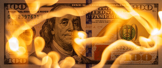 Burning US One Hundred Dollar