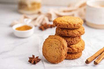 Homemade peanut or almond butter cookies or oatmeal cookies on white kitchen background. High quality photo