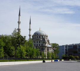 Historic Nusretiye mosque, a significant landmark in Istanbul. Nusretiye mosque's Ottoman architectural ornate beauty. Galataport shopping center. Tophane district, Istanbul, Turkey