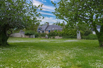 Brittany, Ile aux Moines island, typical house with a garden and menhirs