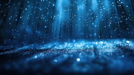 A captivating image of shimmering raindrops cascading down in a tranquil blue environment, evoking a serene and calming ambiance perfect for abstract art enthusiasts.