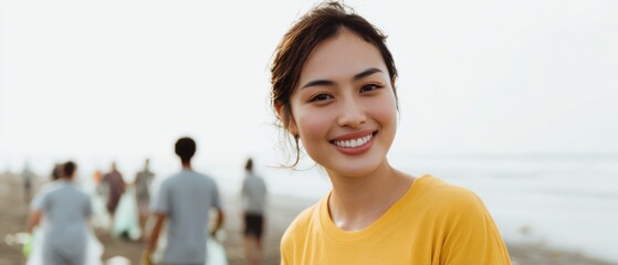 Young Asian Woman Smiling Collecting Trash Beach Clean-Up Campaign