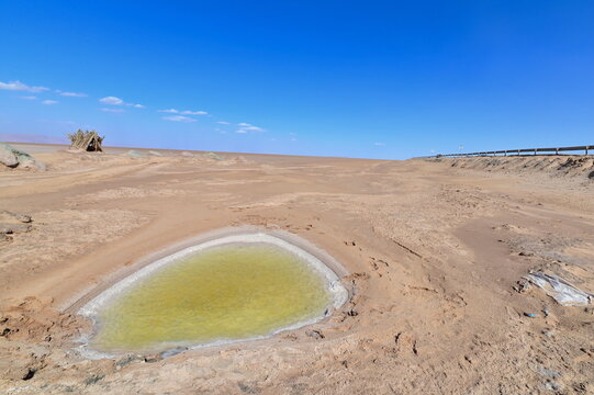 Minimalist Desert Scene of Chott el Djerid with Salt Flat and Blue Horizon in Tunisia