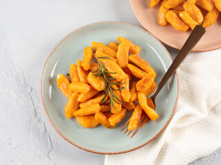 Pumpkin recipe homemade gnocchi on pastel color background