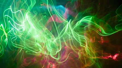 Fototapeta premium Green light trails dance across an abstract backdrop painting it with colorful luminescence