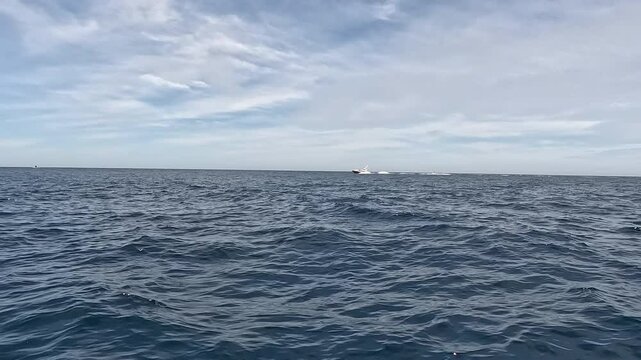 Cabo San Lucas Mexico fishing boat pacific horizon. Cabo, a resort city at southern tip of the Baja California peninsula. ocean destination vacation and business.