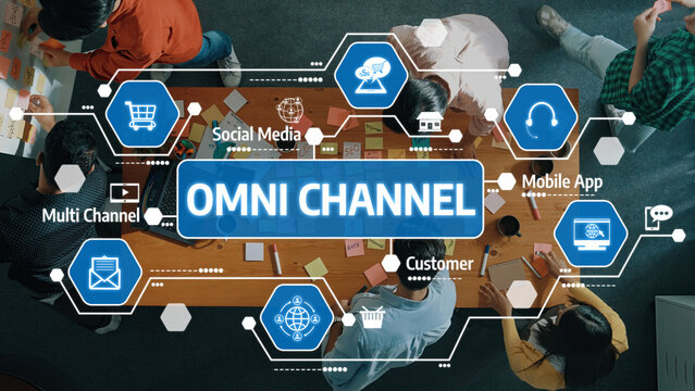 This image showcases a dynamic team engaged in a strategic discussion on omni channel marketing, highlighting key elements, tools, and the importance of customer engagement. Amity