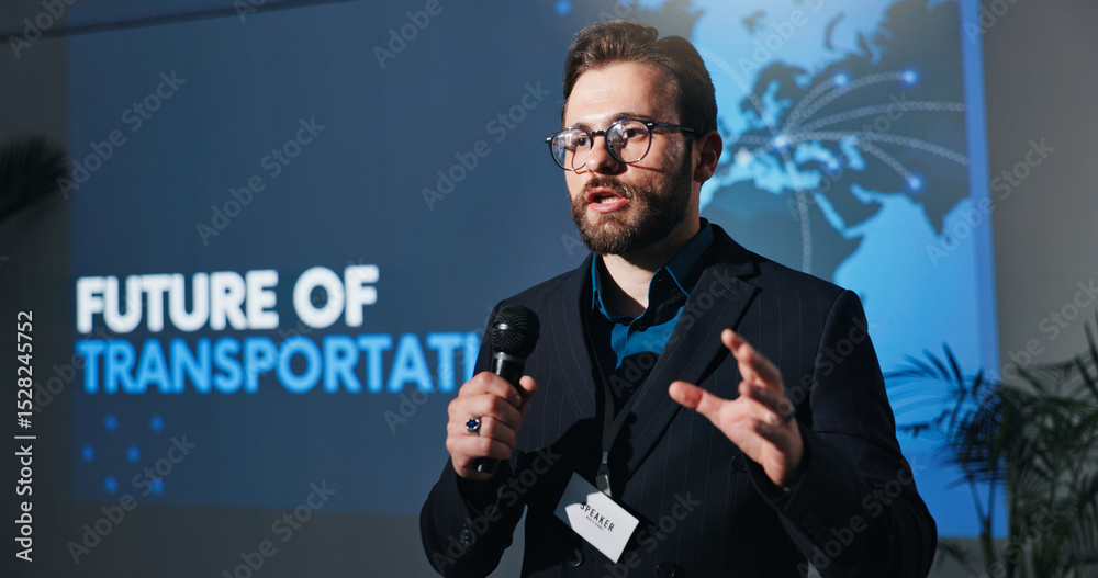 Poster conference, microphone and speech with man on stage for presentation on future of transportation. au