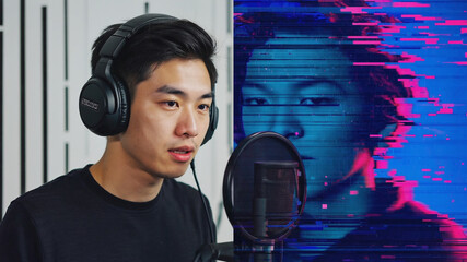 Asian male podcaster wearing headphones and speaking into a microphone with a digital artistic background showing a blue and pink glitch effect of the same person. Image made using Generative AI.