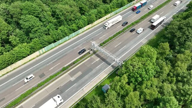 Truck toll - gantry and traffic on German highway. Aerial view
