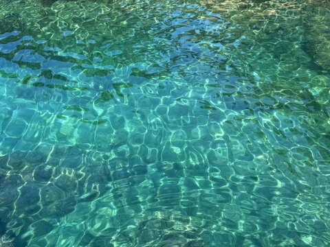 Beautiful sea water clear turquoise surface.