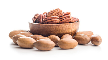 Peeled pecan nuts in bowl isolated on white background.