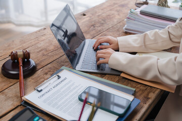 Legal Professional Working on Contract Agreement