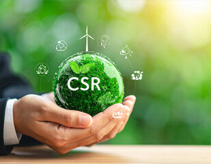 A vibrant green, moss-covered sphere, signifying Earth and nature, is held gently in a person's hands.
