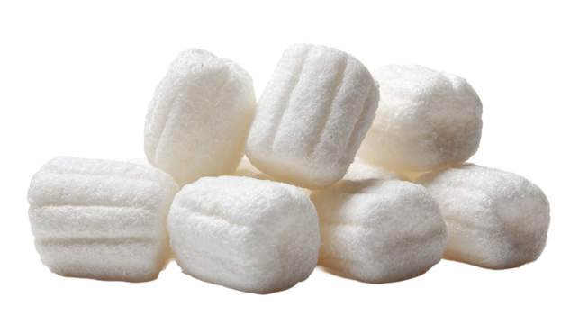 A pile of small, white, biodegradable packing peanuts, showcasing their lightweight and cushioning properties for safe product shipping.