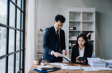 Business Team Analyzing Financial Data in Office