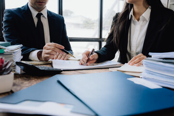 Business Meeting with Documents and Paperwork