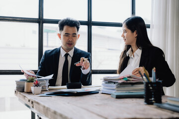 Business Professionals Collaborating at Office Desk