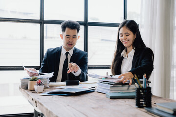 Business Professionals Working Together at Desk