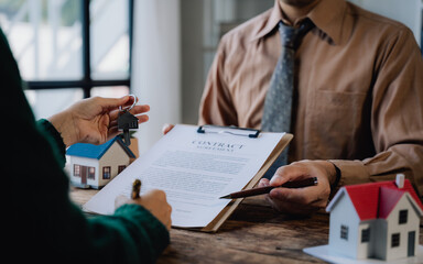 Real Estate Contract Signing with House Keys