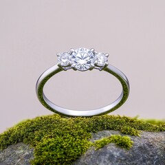 diamond ring with diamonds on green background