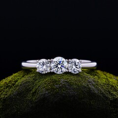 diamond ring on green