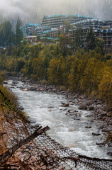 River Flowing In Mountains Area and Residence Area