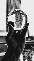 Glass sphere over geometric pattern
