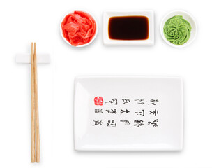 Set of sushi tablewear. Top view on empty rectangular sushi plate with hieroglyphs, saucer, ginger,...