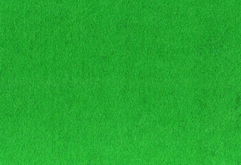 Green felt fabric close-up for a Christmas textile texture background, stock photo image