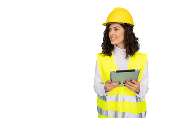 Professional female engineer wearing safety vest, hardhat, examining digital tablet against transparent backdrop