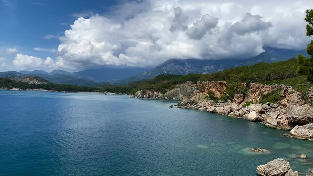 Panoramic view of the mountains and rocks of the Phaselis coast near Kemer, Antalya, Turkey. High quality 4k footage.