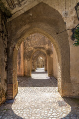 Obraz premium Italy, Calabria, Paola. The Sanctuary (or Shrine) of St Francis of Paola. Arches in the old section.