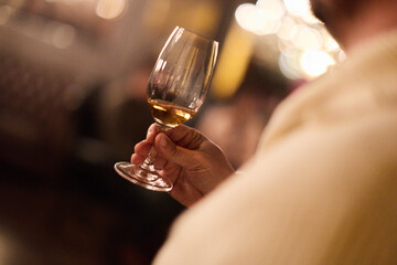 Man Holding Whiskey Glass 