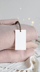 Stack of Pink Knitted Sweaters with Blank Tag