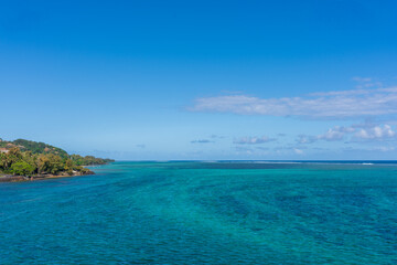 tropical beach with blue waters