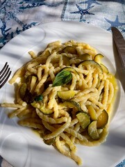 Plate of fresh Italian pasta with zucchini