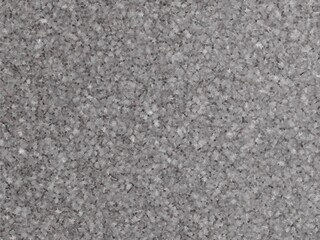 Seamless speckled grey granite texture provides a versatile and realistic stone background for design projects.