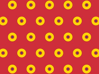 Seamless pattern of yellow circles with blue centers on a red background, creating a bold and vibrant design.