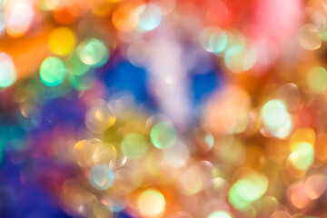 Blurred glowing spots create a golden bokeh effect perfect for joyful holiday and celebratory visual design