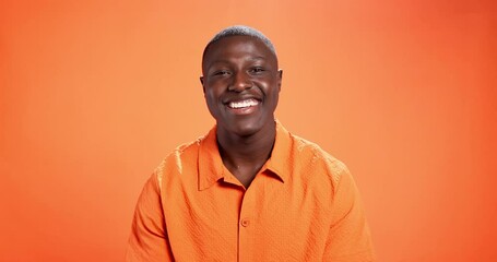 Fashion, face or black man thinking of solution in studio with insight, creative idea or aha moment. Mockup, person and happy with style inspiration, problem solving and eureka on orange background