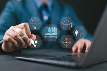 E-learning Concept, Man using laptop with virtual E-Book icons for online knowledge base, Digital...