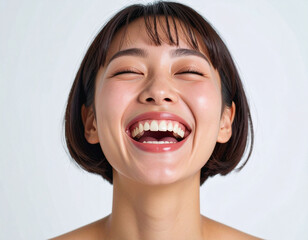 満面の笑顔の若い女性/
A young woman with a big smile