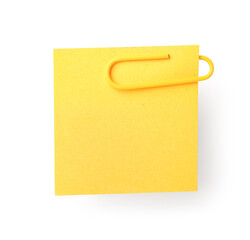 Yellow sticky note with paper clip on white background