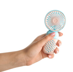 Female hand with mini electric fan on white background